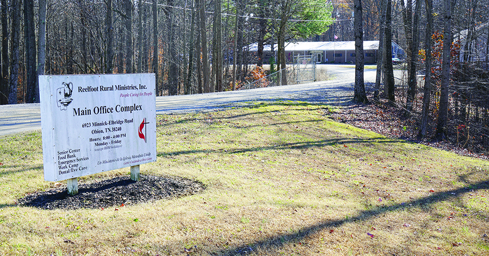 Reelfoot Rural Ministries sign placed at the entrance with the building in the background