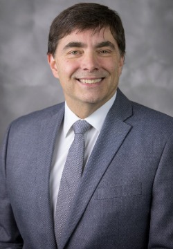 Charles Phillips, President and CEO
