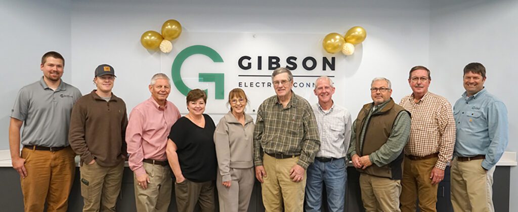 Jeff Boyd poses with the field and engineering compliance team at his retirement reception.