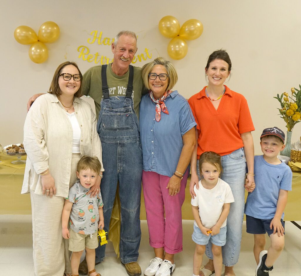 Jeff Fox poses with family at his retirement reception.