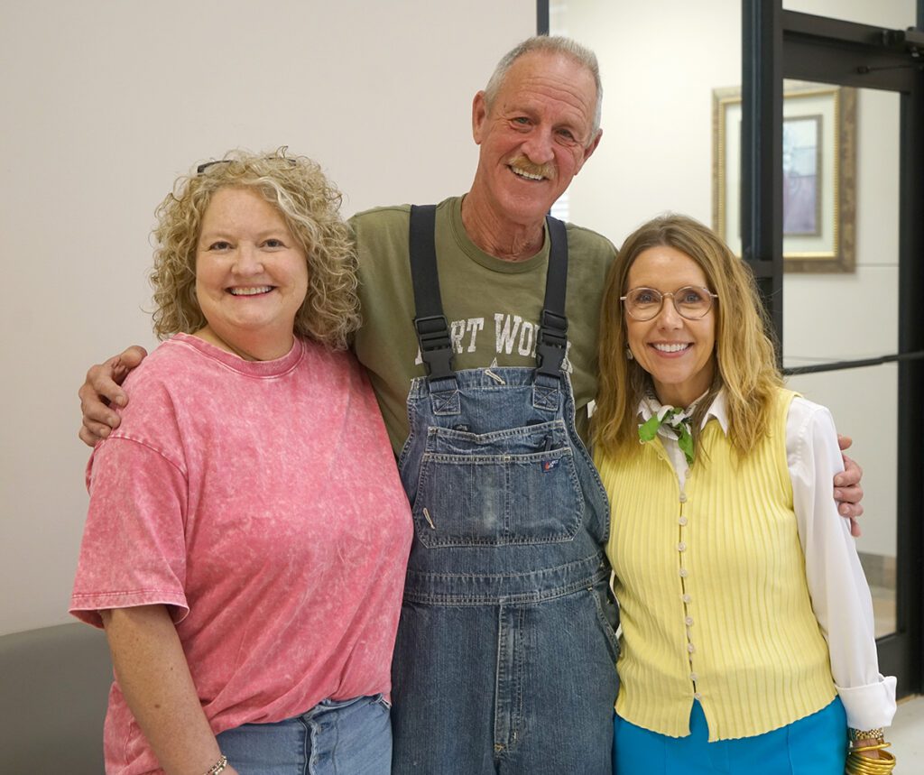 Jeff Fox poses with friends at his retirement reception.