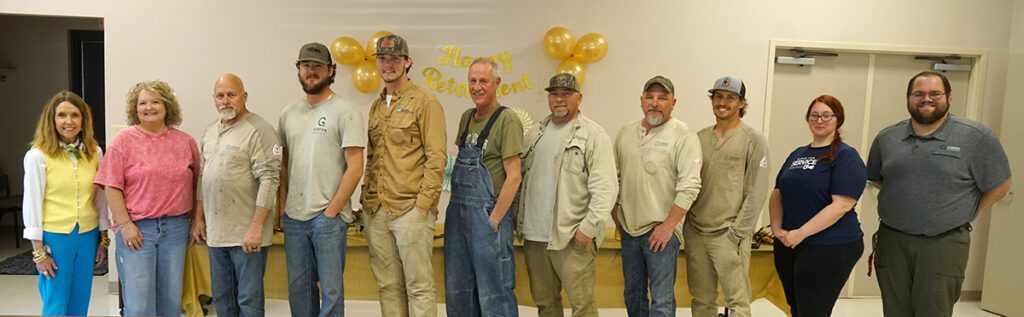 Jeff Fox poses with members of his Alamo team at his retirement reception.